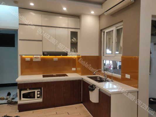 CTTB Kính ốp bếp Nhũ Cam Vàng thi công tại CT12C Kim Văn Kim Lũ - Hoàng Mai